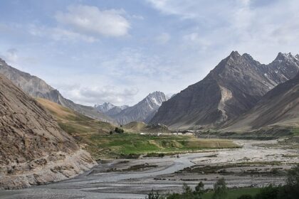 Pin Valley National Park in Himachal Pradesh, with snowy peaks of the mountains and a river, one of the scenic parks in Himachal Pradesh.