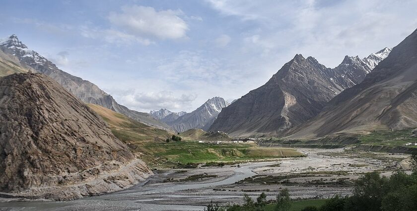 Pin Valley National Park in Himachal Pradesh, with snowy peaks of the mountains and a river, one of the scenic parks in Himachal Pradesh.