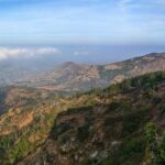 Scenic sunrise view from Nandi Hills, a popular spot among picnic places in Karnataka.