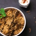 Delicious chicken biryani served hot at one of the best restaurants in Jayanagar Guwahati.