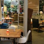 Hi Spirits restaurant interior with fine dining setup, one of the best Restaurants in Siliguri.