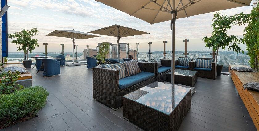 Daytime rooftop dining setup with city views at rooftop restaurants in Siliguri.