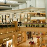 The interior of UB City Mall showcases luxury brands and a vibrant atmosphere for shopping in Karnataka.