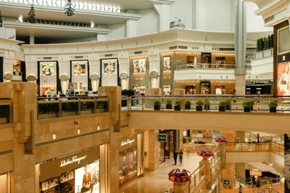 The interior of UB City Mall showcases luxury brands and a vibrant atmosphere for shopping in Karnataka.