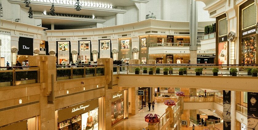The interior of UB City Mall showcases luxury brands and a vibrant atmosphere for shopping in Karnataka.
