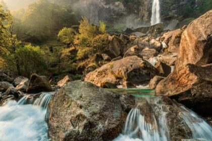 Wimberley Gunj Waterfall flows through a lush forest, one of the waterfalls in Andaman.