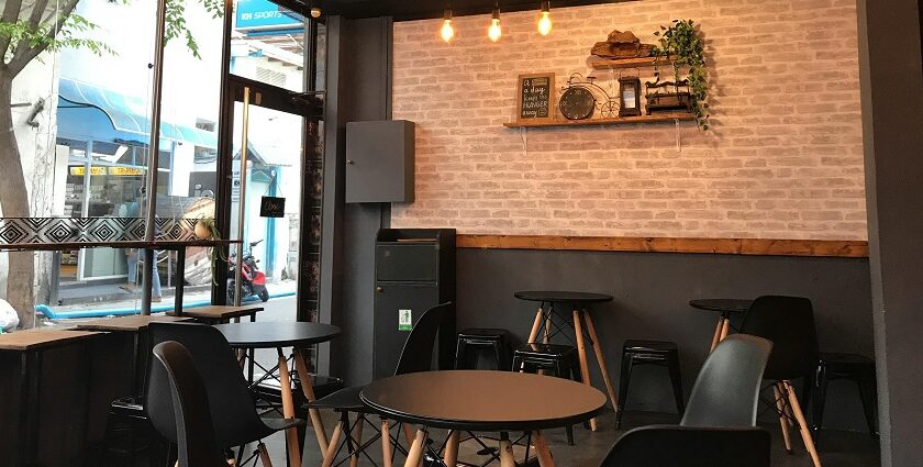 Elegant interior of Kameng Fusion with black chairs and lights, one of the best restaurants in Itangar.