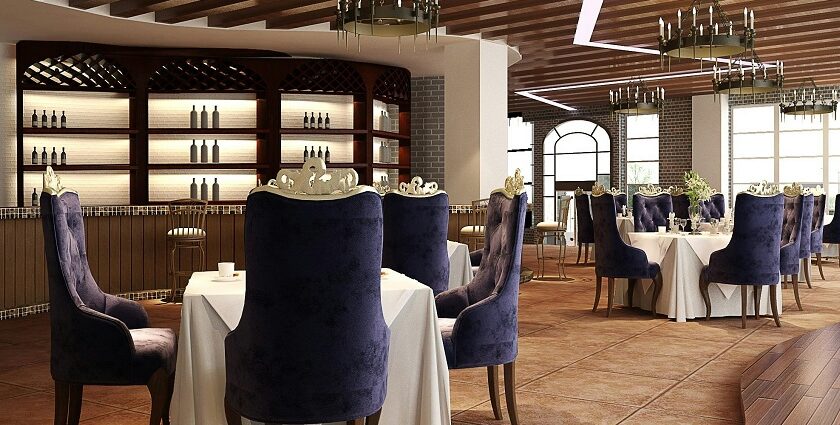 Interior of China Valley Restaurant with white tablecloths and purple chairs restaurants in Pasighat.