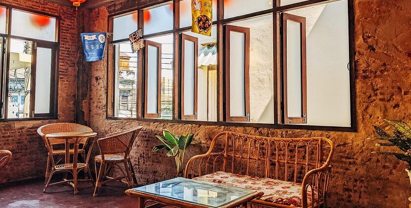 Cosy cafe Shillong interior with wooden lounge chair and table, one of the top restaurants in Shillong.