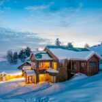 A breathtaking snow-clad view of Gulmarg, one of the best places with snowfall in India.