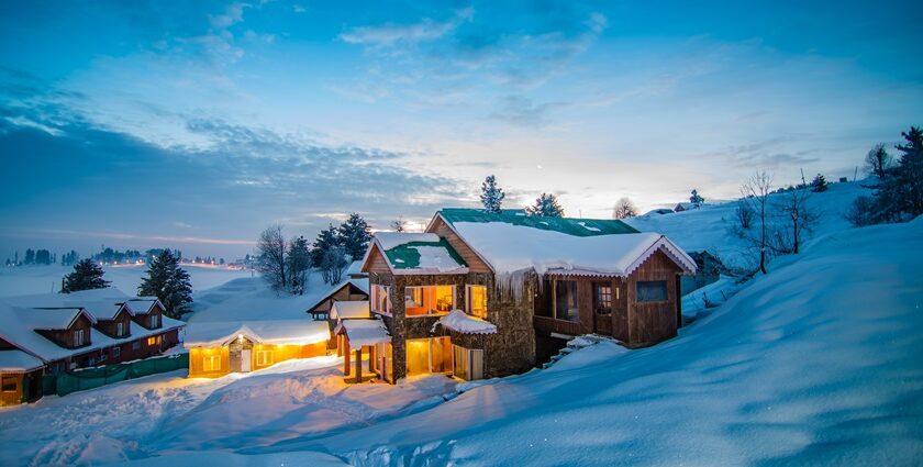 A breathtaking snow-clad view of Gulmarg, one of the best places with snowfall in India.