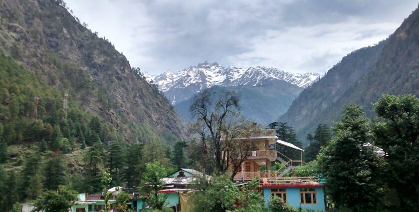 Snow-capped Shivalik mountains viewed from Kasol village, Himachal Pradesh, showing snowfall in Kasol.
