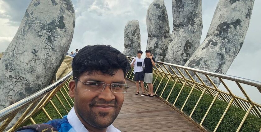 A mesmerising view of the Golden Bridge elegantly nestled in the Ba Na Hills, Vietnam.