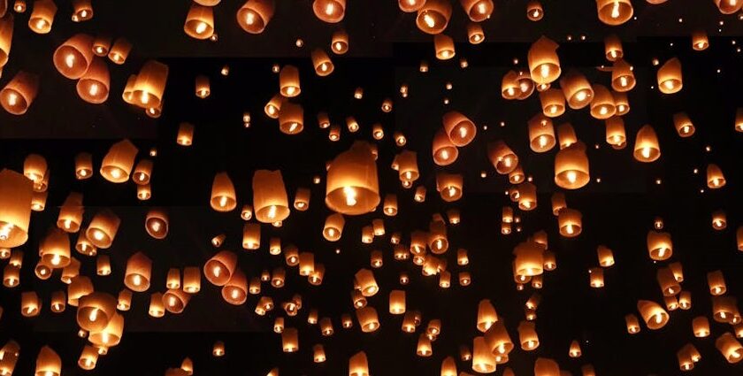 Thousands of glowing lanterns light up the sky during the Yi Peng Lantern Festival.